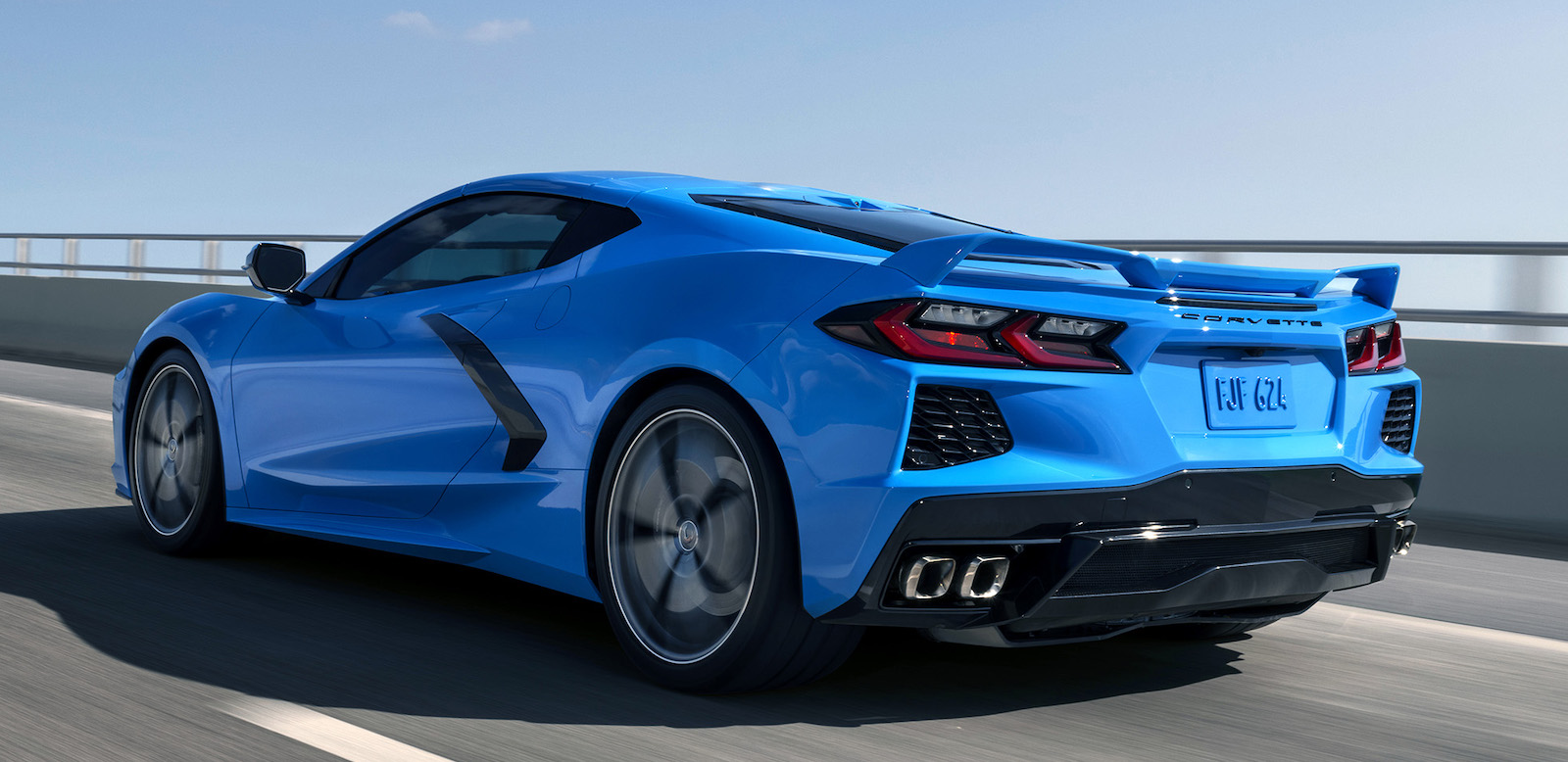 Mid-engine 2024 Chevrolet Corvette Stingray - left rear profile at-speed
