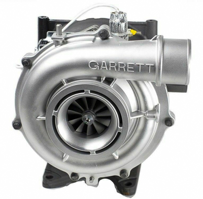 A variable vane turbocharger on a white background
