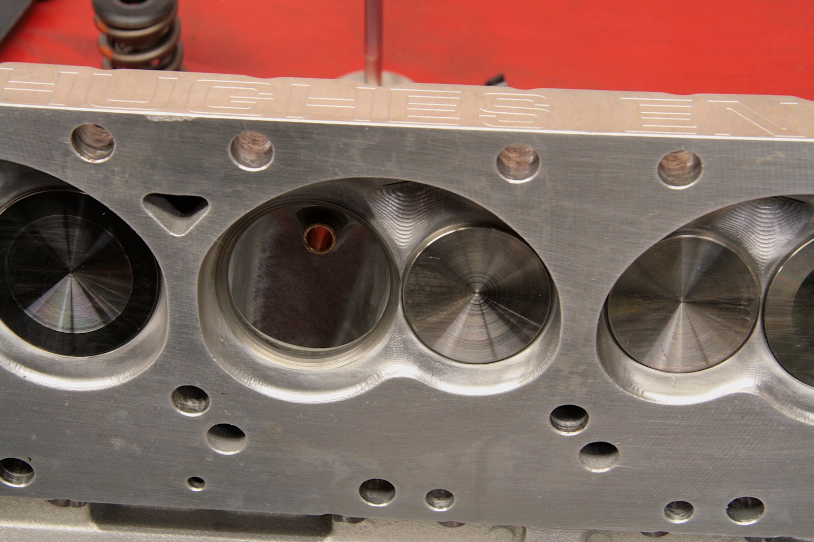 The intake valves are larger than the exhaust valves.