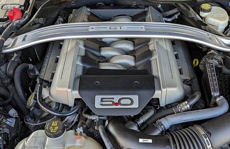 Looking down into the engine bay of a Ford Mustang GT