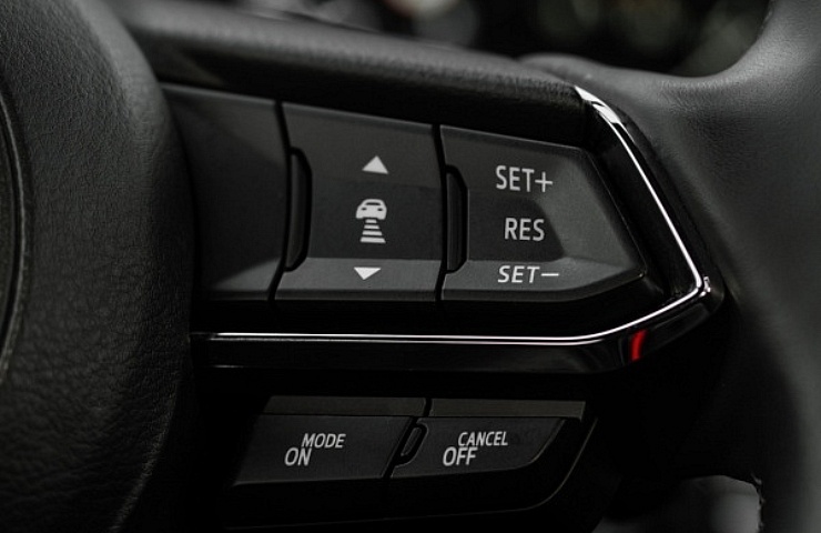 Adaptive cruise control switches on steering wheel - featured