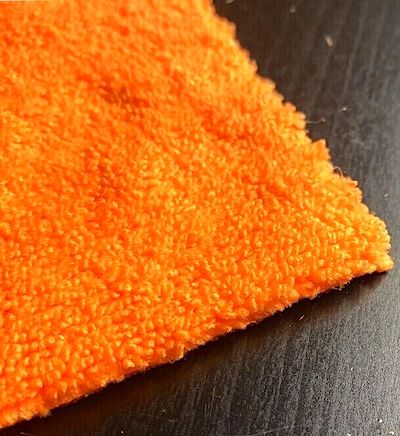 Orange edgeless microfiber towel