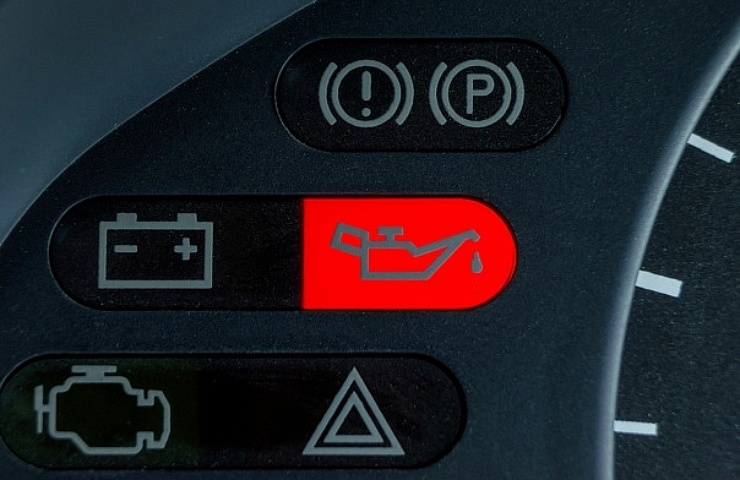 Oil warning light illuminated on the dashboard