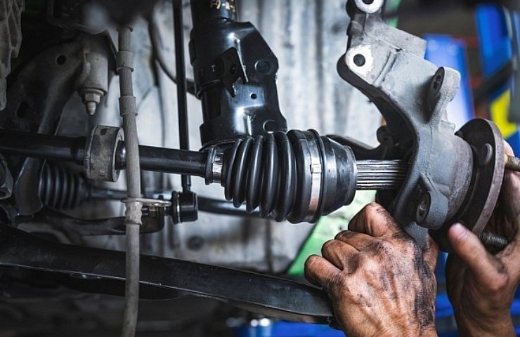 Replacing CV axles on a front wheel drive car.