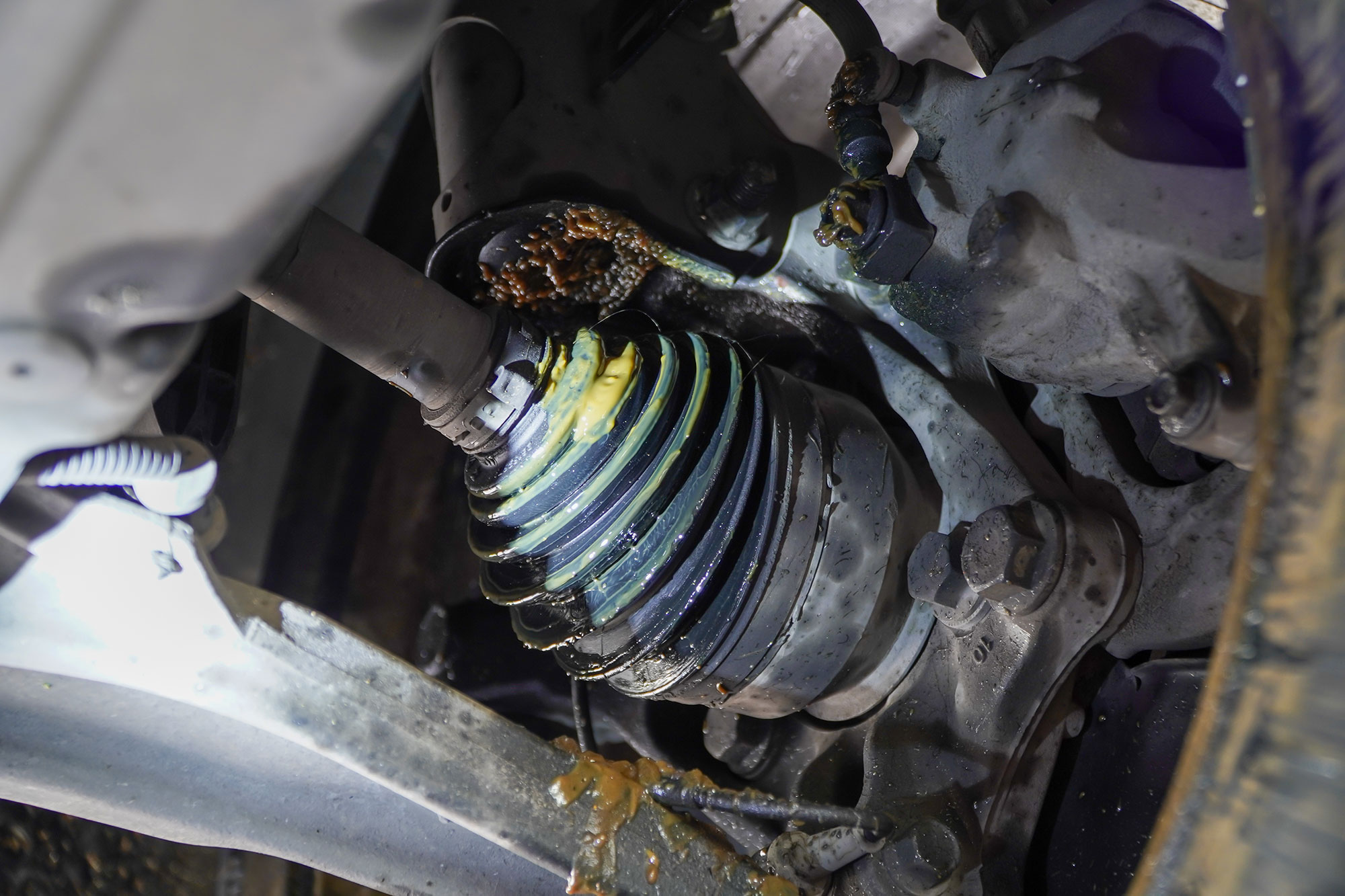 Damaged CV axle boot