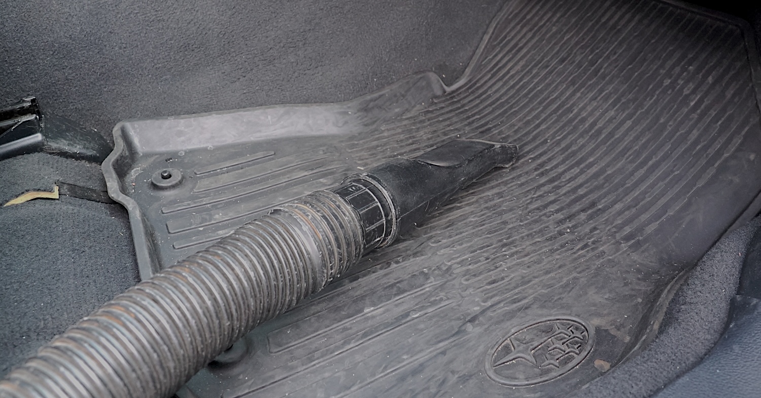Vacuuming the floor mats ia one of the first steps when cleaning car interiors.