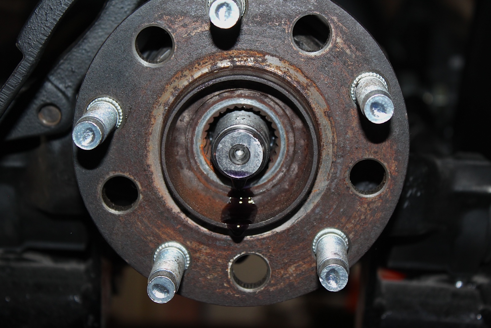 The outer hub is secured with a large nut.