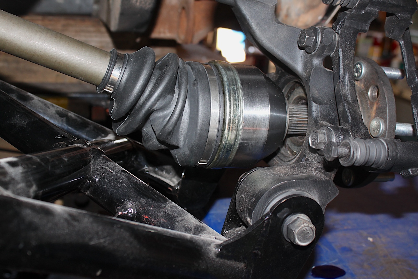Compressing the CV axle can be really easy or quite difficult. 