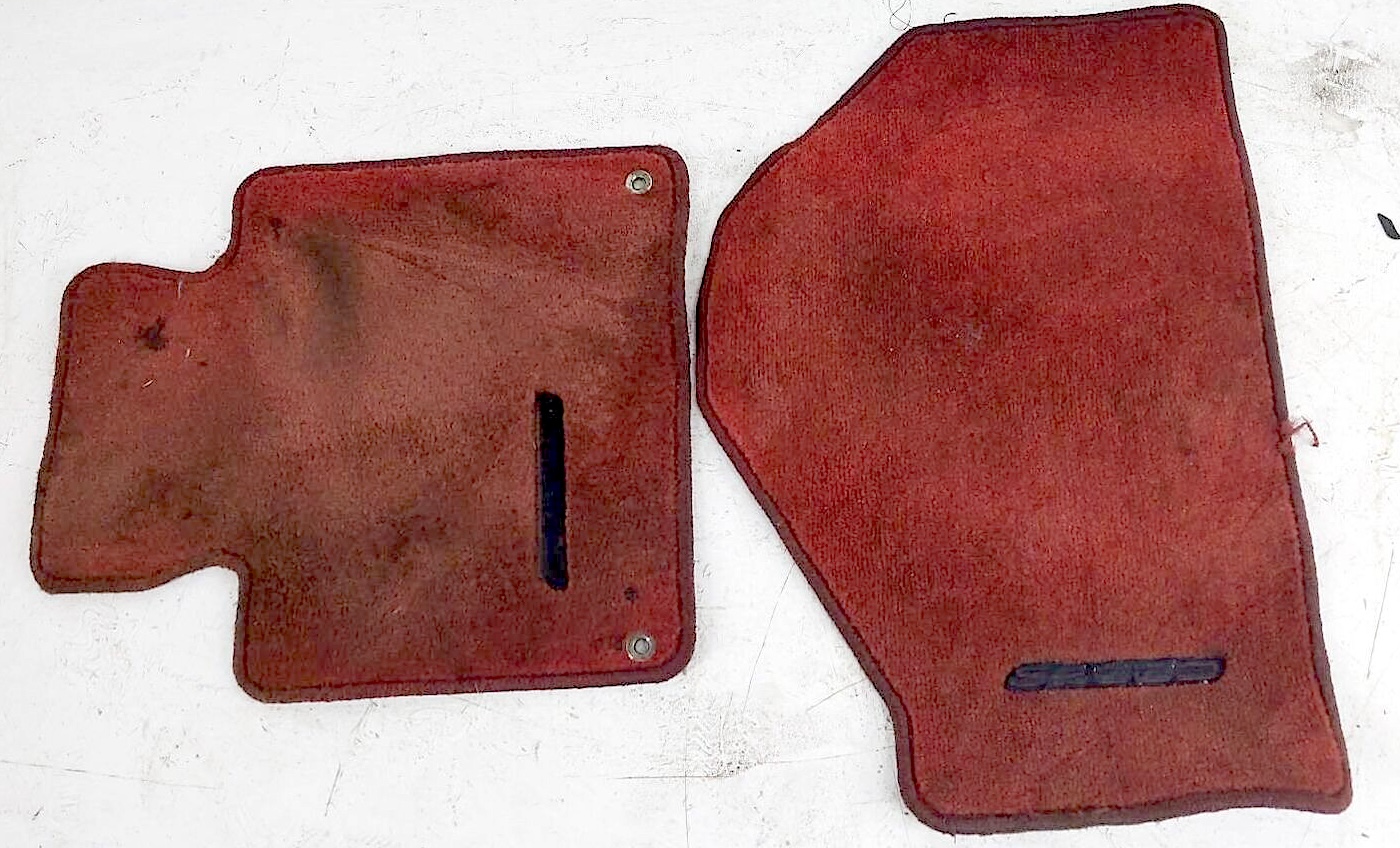 Dirty red Honda S2000 floor mats