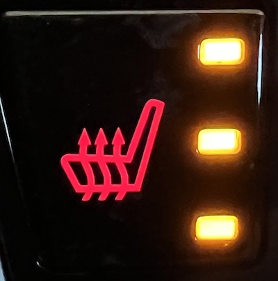 Illuminated three level heated seat button