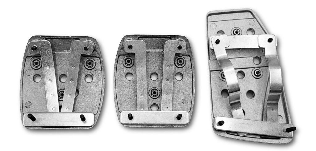A rear view of a set of universal car foot pedals showing the attachment hardware. 