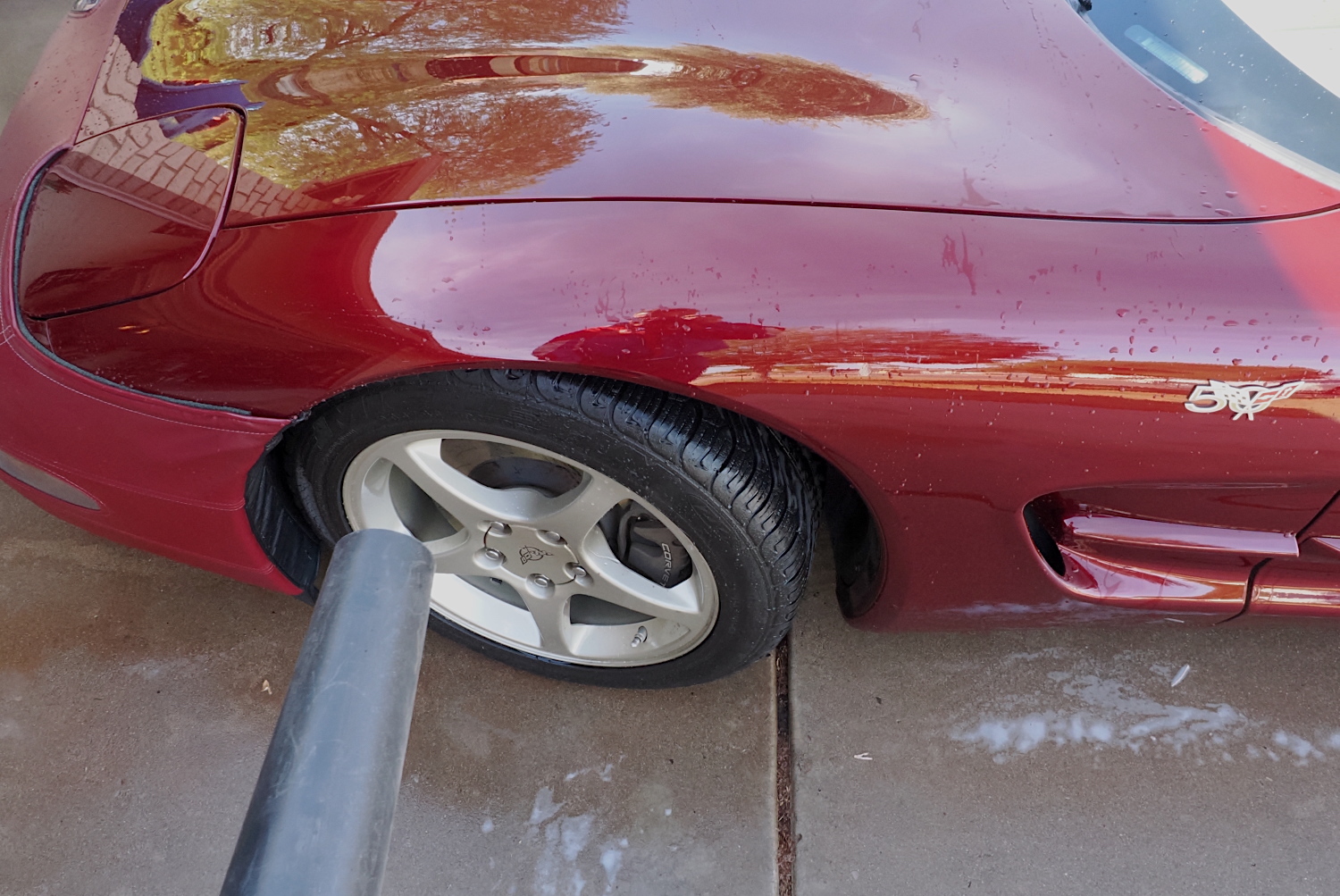 Using a leaf blower after washing your car to remove excess water