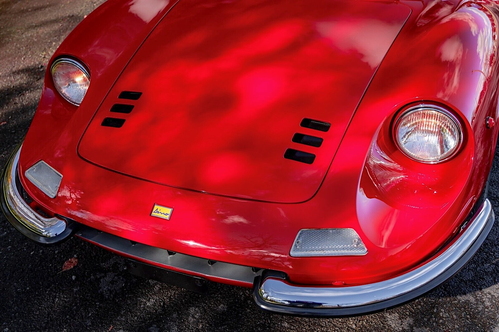 Hood vents, headlights, split front bumper