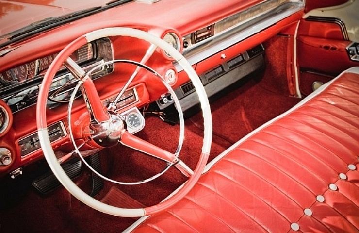 Electric power steering conversion - classic red American car interior, with dashboard and steering wheel - featured