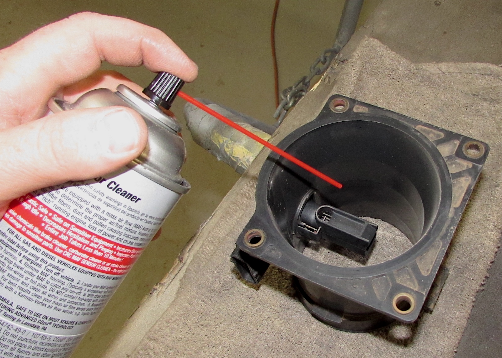 With the MAF sensor housing removed, spray the cleaner on everything.