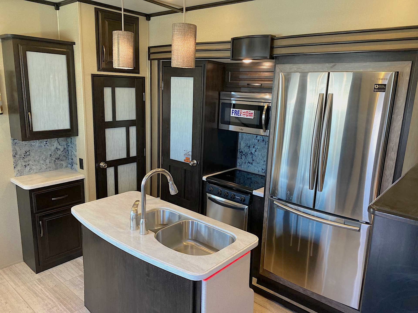 2017 Grand Design Momentum 376TH Toy Hauler - kitchen sink, range, and upgraded refrigerator 