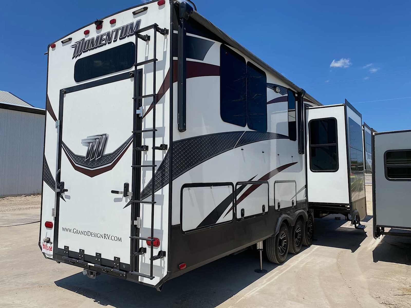 2017 Grand Design Momentum 376TH Toy Hauler - right rear profile, garage closed