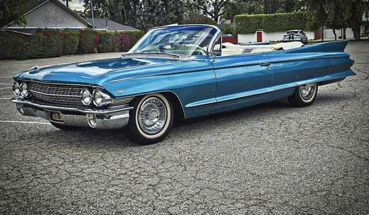 1961 Cadillac Biarritz Convertible - left front profile, top down