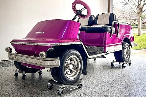 Pink Harley-Davidson golf cart - left front profile